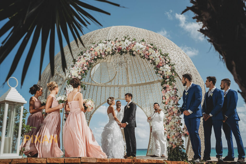 wedding ceremony in a dome like wedding gazebo