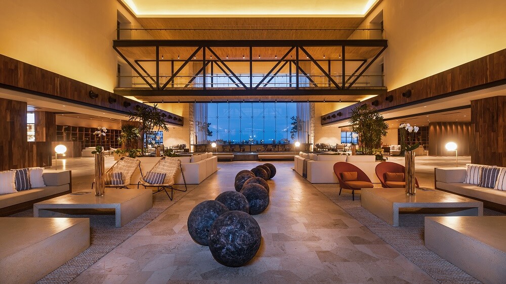 main lobby area with the lobby bar in the background for an atelier playa mujeres wedding