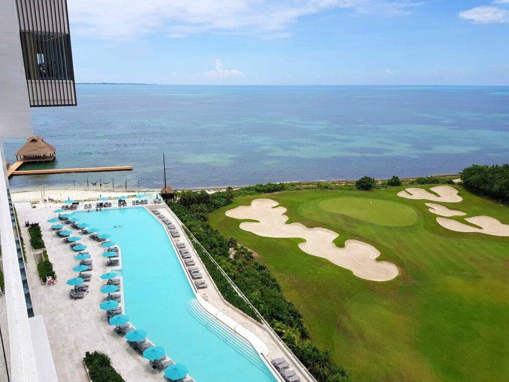 dreams vista cancun view of the pool, golf course and ocean