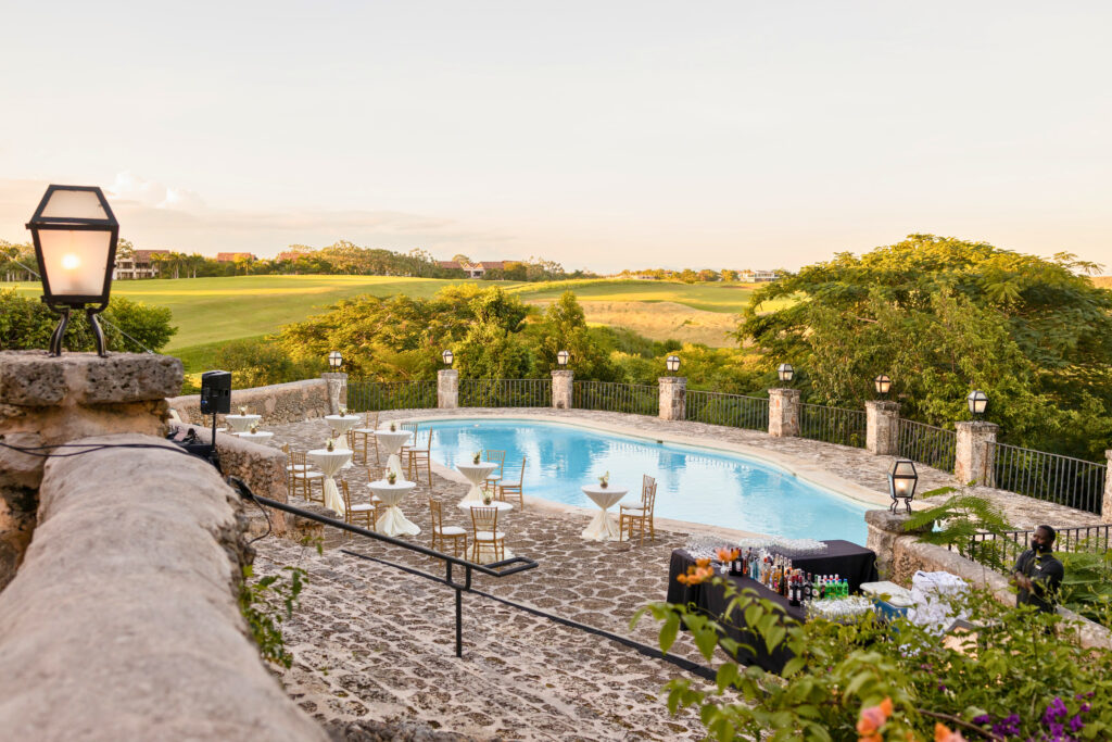 Lovely hotel terrace with a pool overlooking the camp