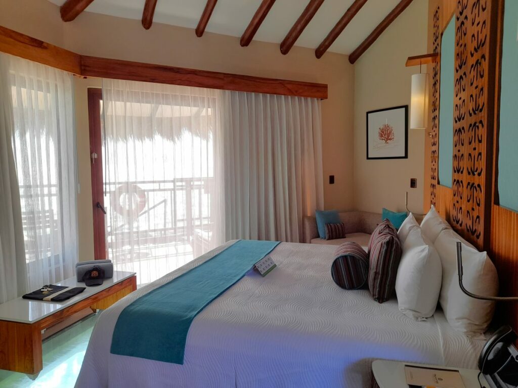 interior of the over the water bungalows at el dorado maroma