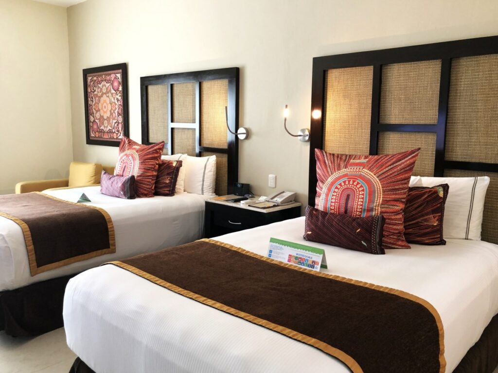 Hotel room with two double beds at a beach wedding resort in cancun