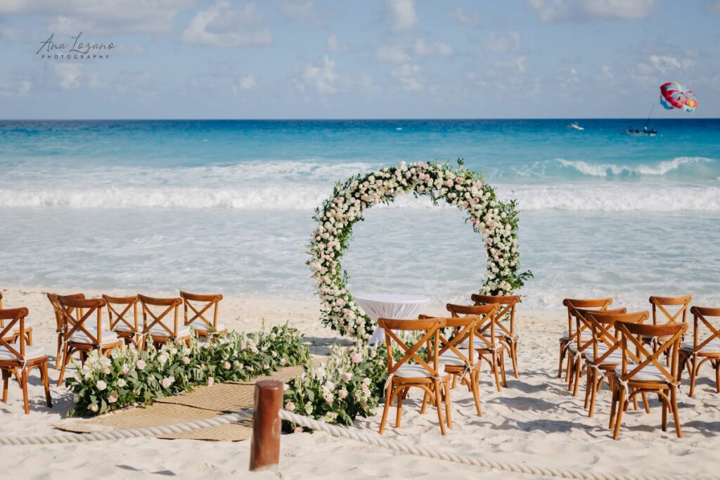 beach wedding ceremony at an all inclusive resort in cancun