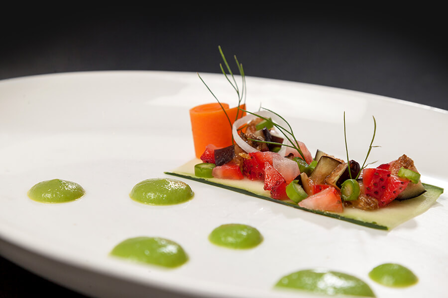 gourmet food platter with colorful fruit and vegetables