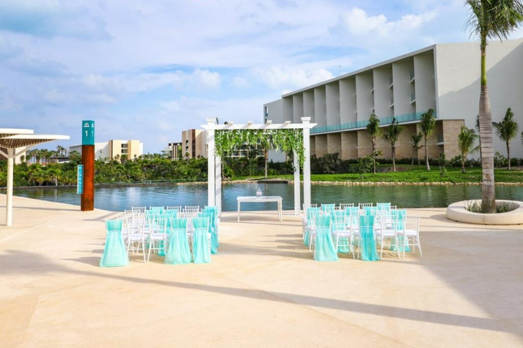 resort ballroom with blue carpet and geometrical style ceiling