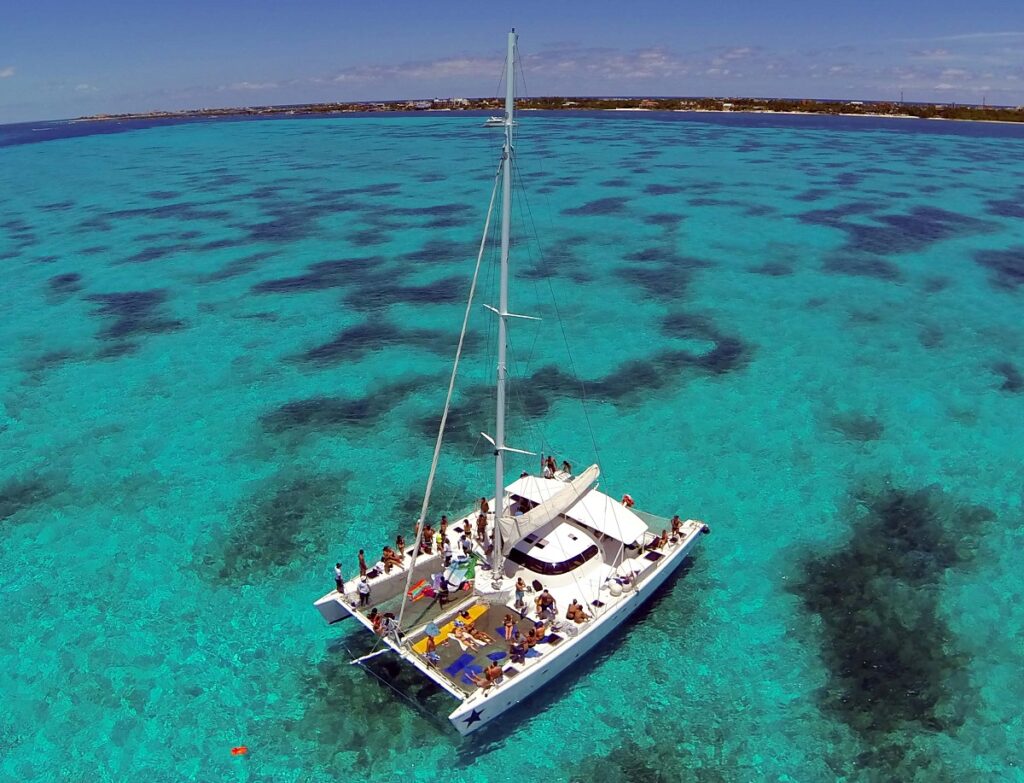 aerial view of a group catamaran near isla mujeres cancun