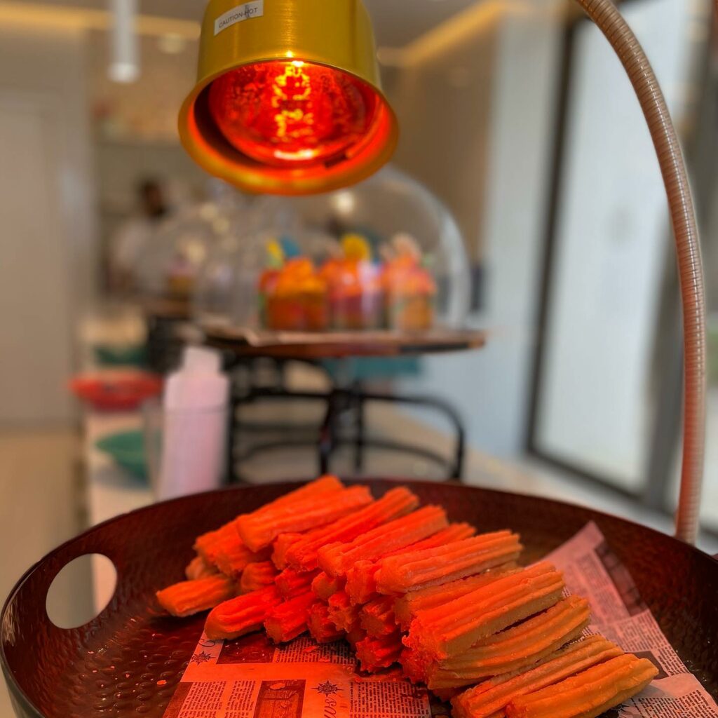 sweet churros with a lamp