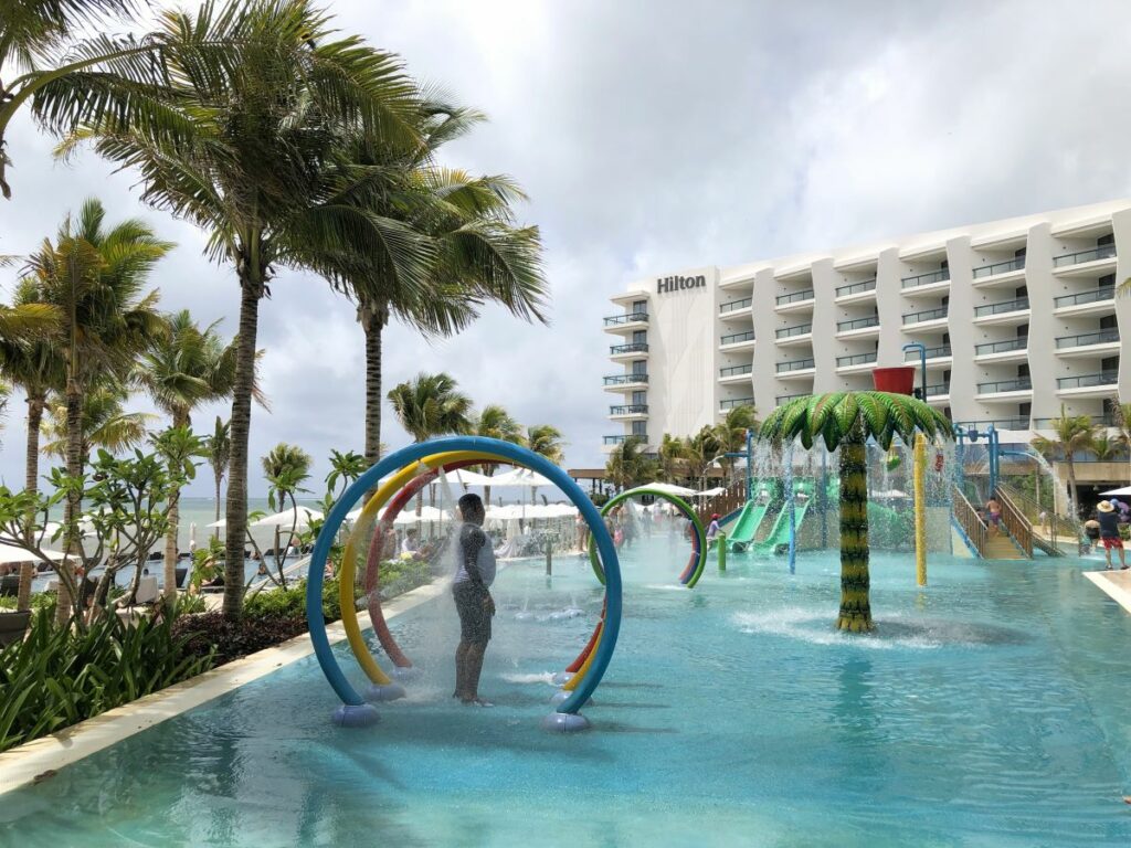 kids water park with water jets and slides