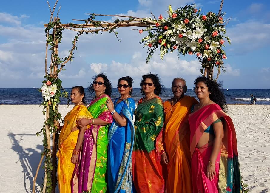 colorful saris on the beach destination wedding