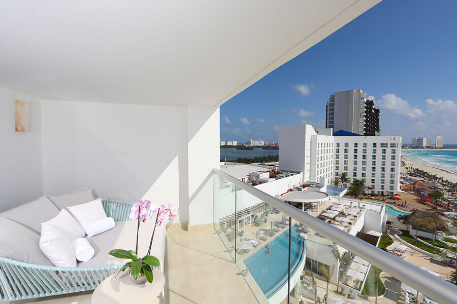 balcony at leblanc resort with pool and beach view