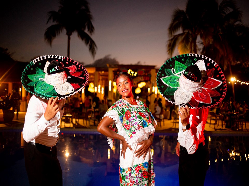 mexican theme night with dancers dressed in typical costumes and big sombreros