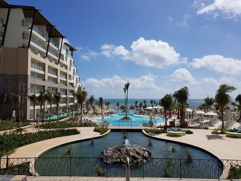 Pool and grounds at the Now Natura Hotel