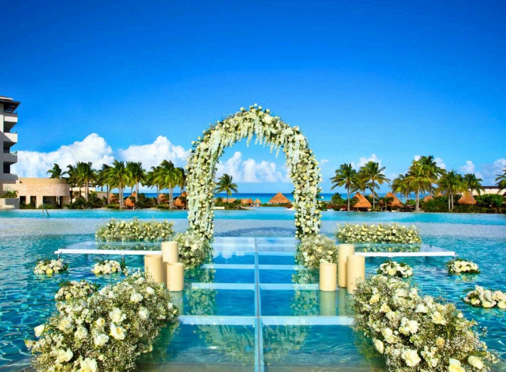 Beautiful wedding gazebo set up on a resort pool