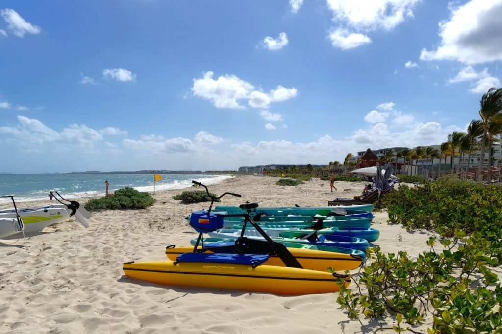 pedal kayaks on a sandy beach in cancun