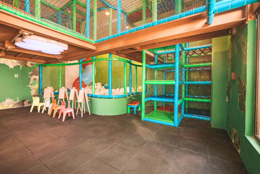 Hotel kids club with a maze and painting canvas