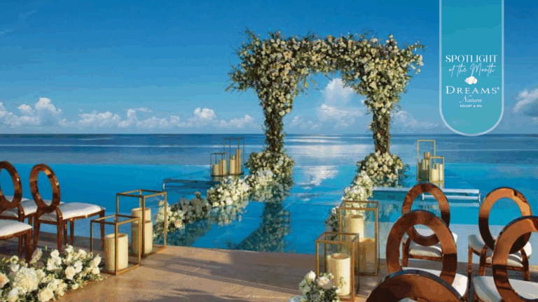 Over the water Destination wedding ceremony set-up overlooking the ocean at Dreams Natura Resort and Spa