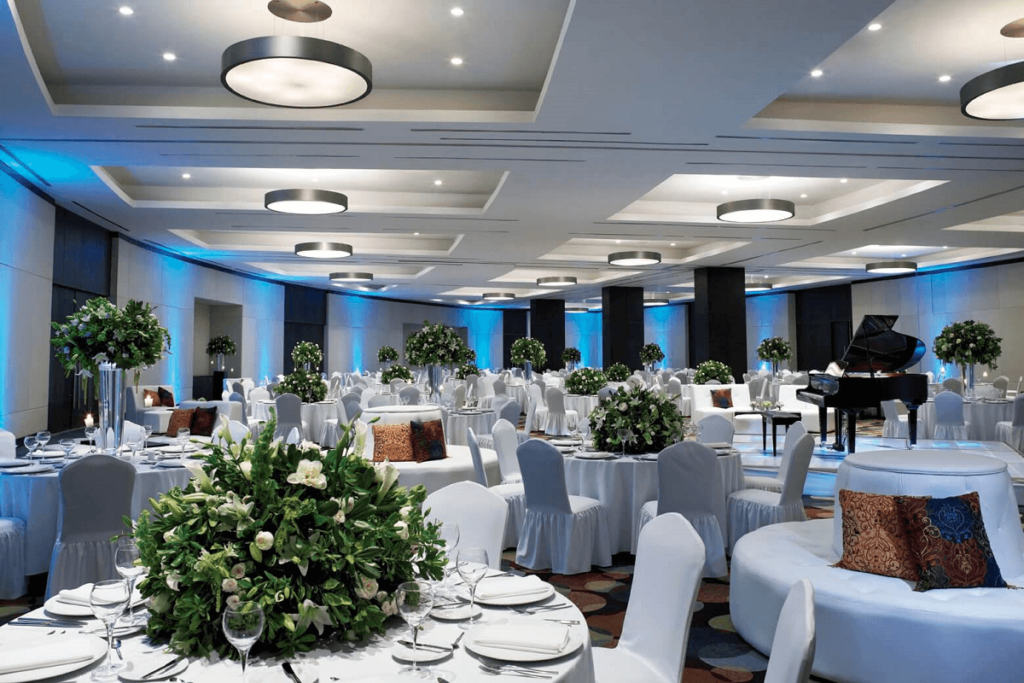 Banquet service with flower arrangements at ballroom